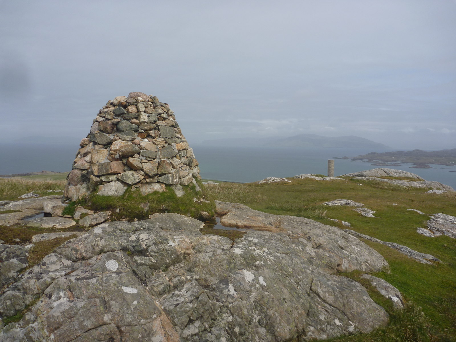 Summit cairn on Dùn Ì by day, the highest point on Iona, looking out to sea