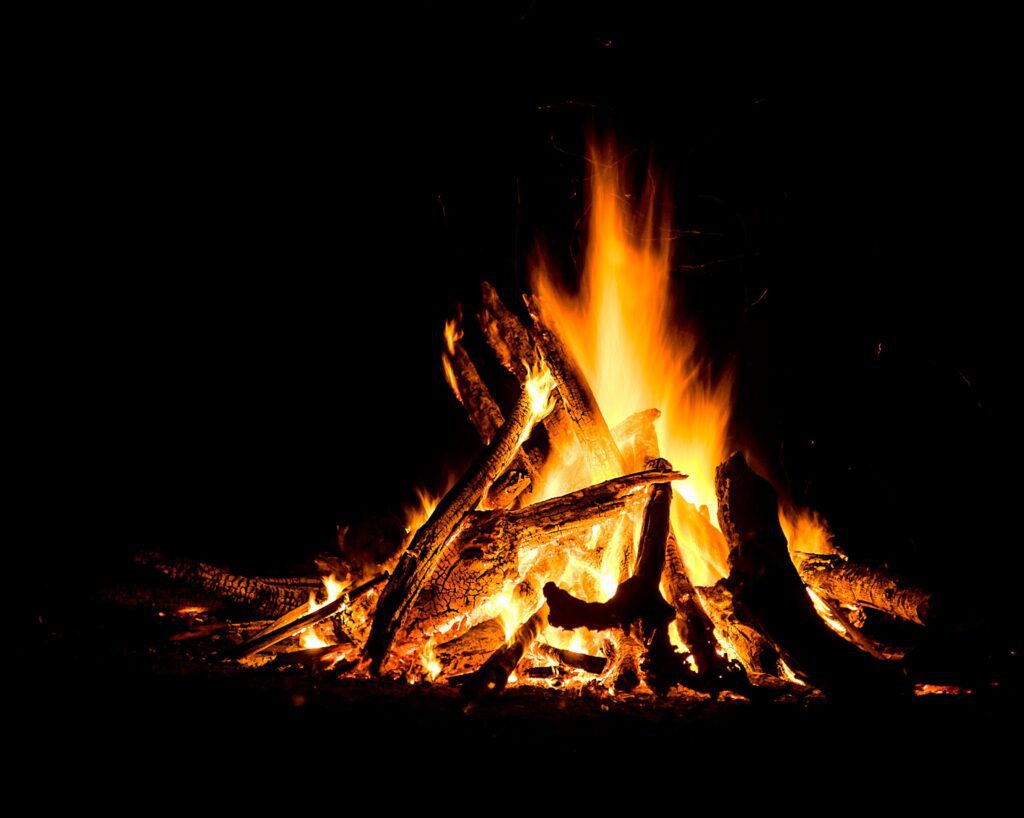 Bonfire blazing against the darkness