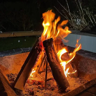 Blazing hearth fire at night